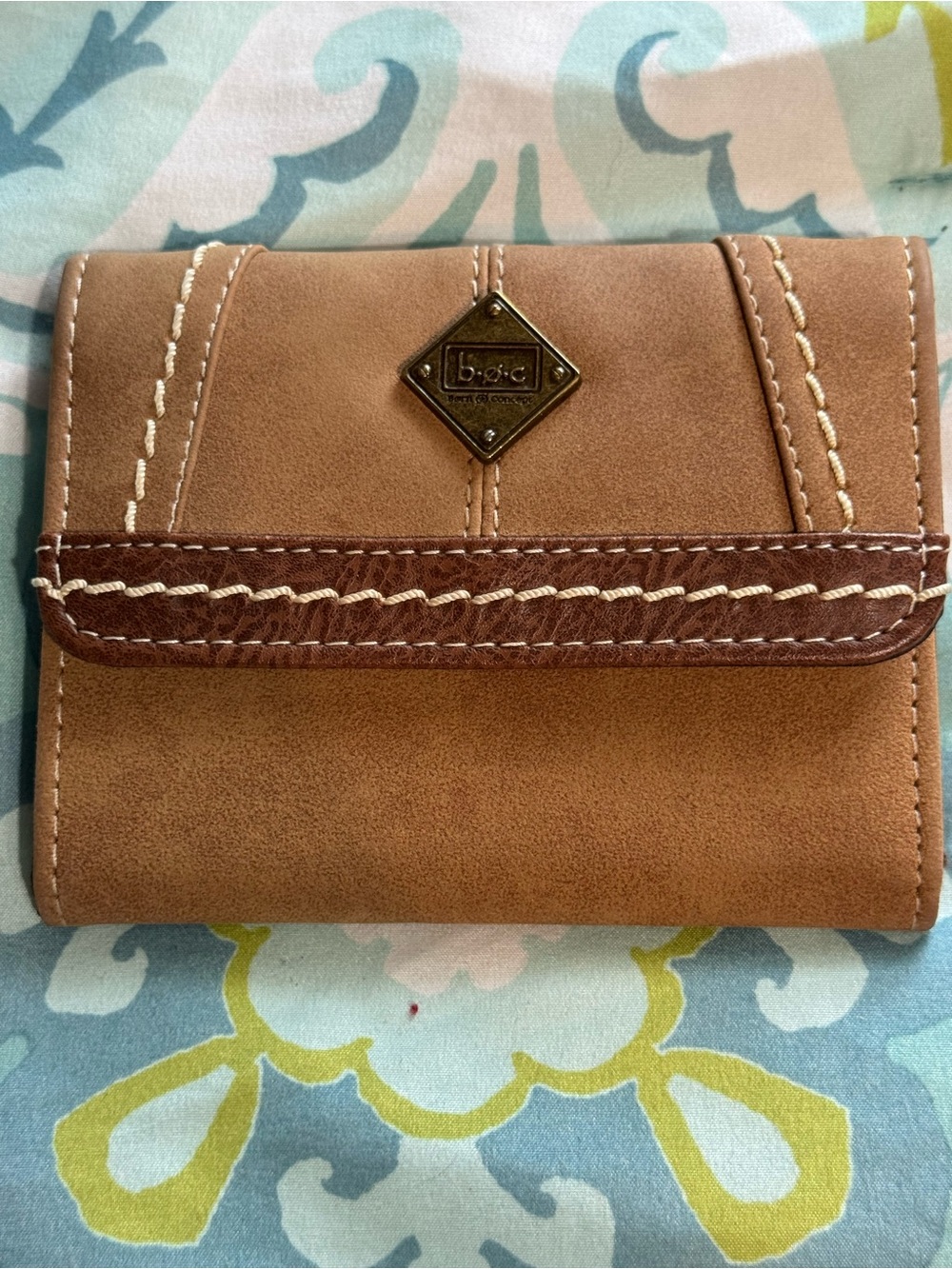 Brown Born Concepts trifold wallet.